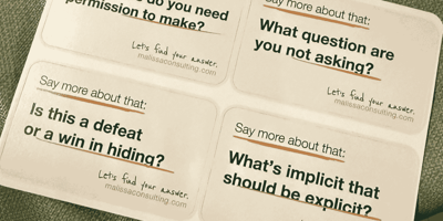 sticker sheet with four branded stickers, each featuring a creative prompt